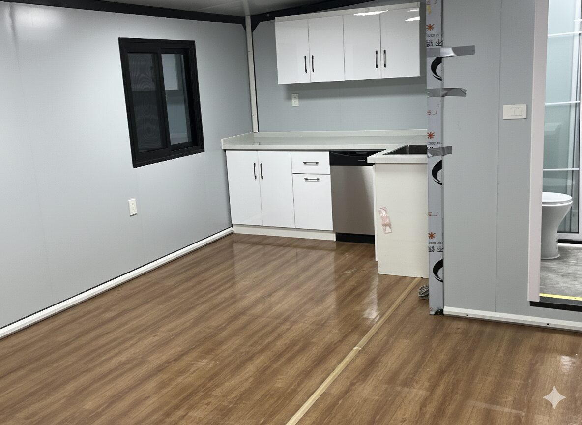 Kitchen and living area in the Comanche container tiny home